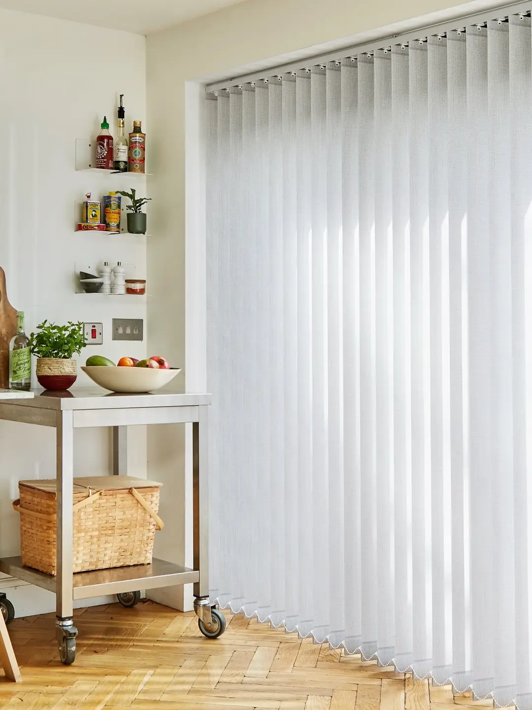 Vertical blinds installed on a patio door in a Greater Victoria home