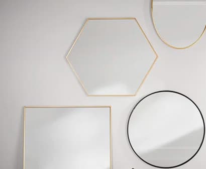 Custom framed vanity mirror by Geet Glass & Closet